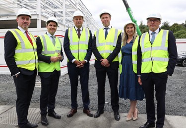 Tánaiste Leo Varadkar with Derek Mowlds of PM Group and members of the NIBRT project team