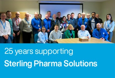Group photo of team celebrating 25 years supporting Sterling Pharma Solutions.