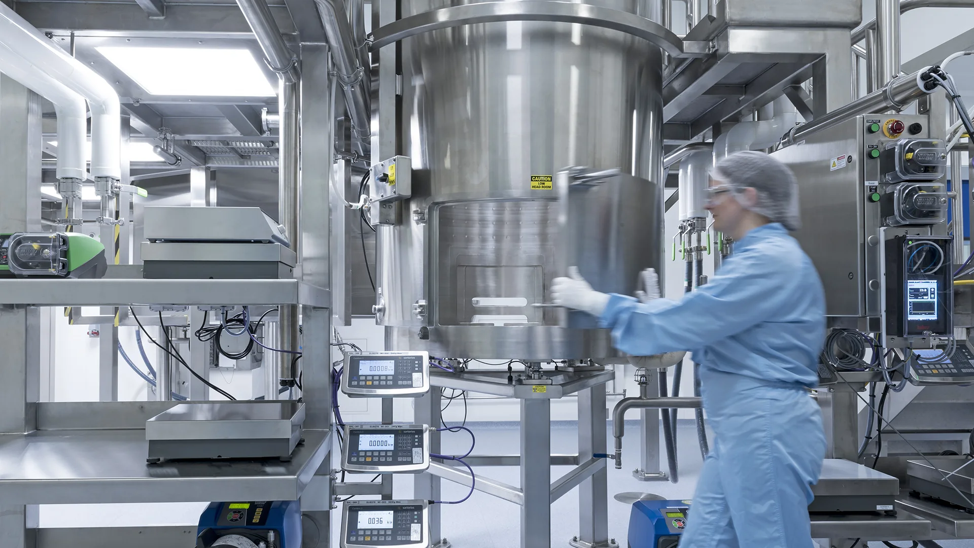 Operator in high-tech pharma manufacturing plant
