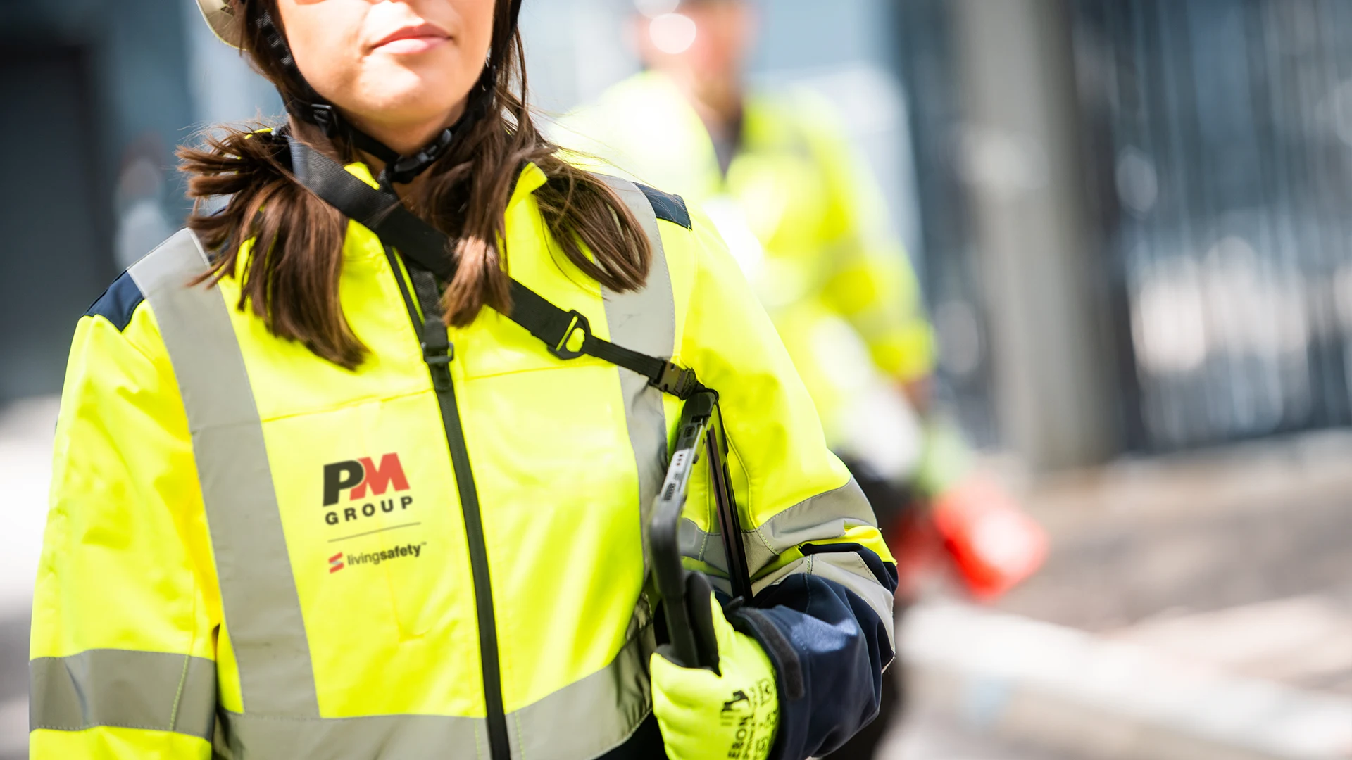 Person on a project site in PM Group 'Living Safety' PPE